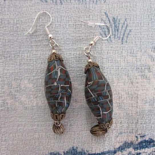 Retro home-made earrings made using vintage abstract pattern beads