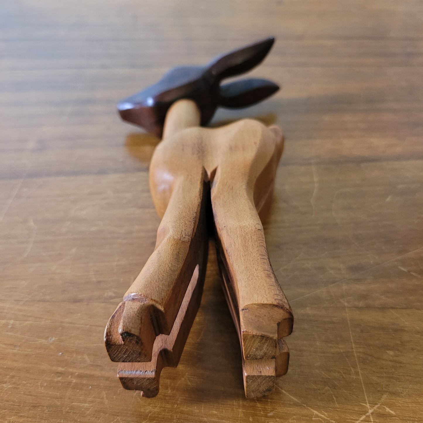 Mid-century hand-crafted mismatched wooden deer corkscrew with googly eyes