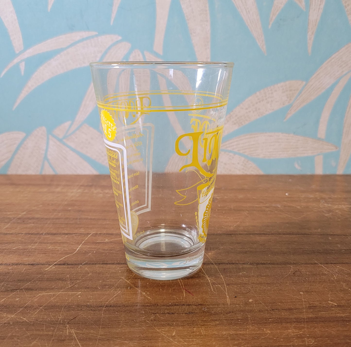 Set of six vintage French 'Limonade Original' yellow lemonade glasses