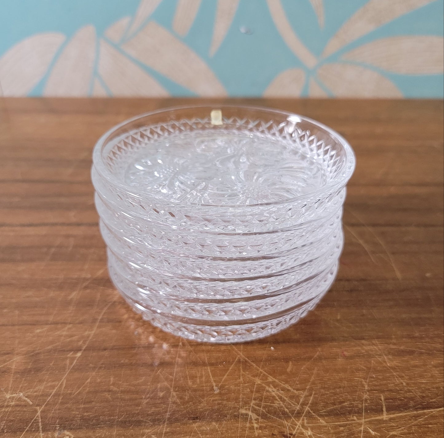 Set of six 1970s/80s Cristal D'Arques lead crystal flower design glass coasters