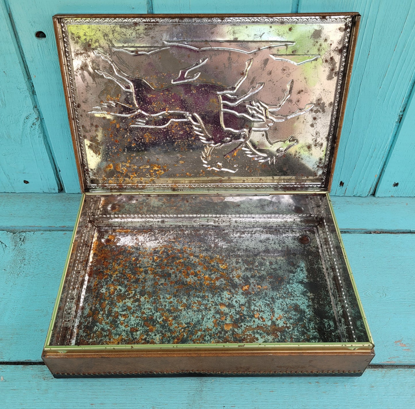 Vintage Chymos, Finland, rectangular candy tin with embossed galloping horses design