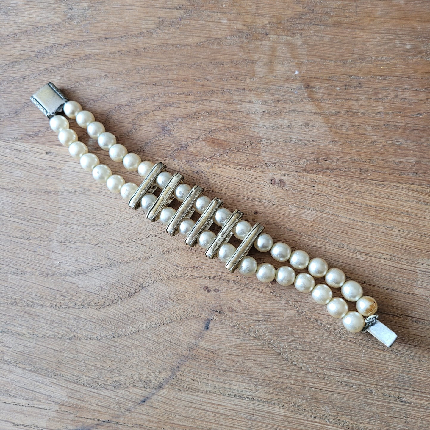 Vintage double strand faux pearl bracelet with rhinestone detailing