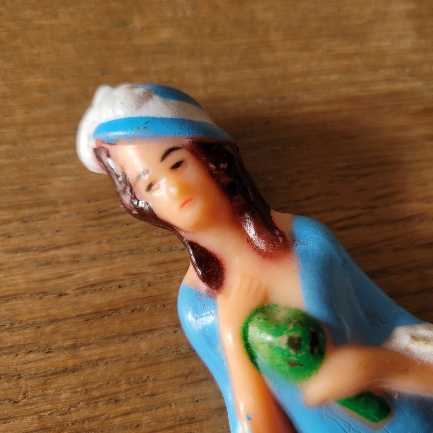 Vintage celluloid lady cake topper