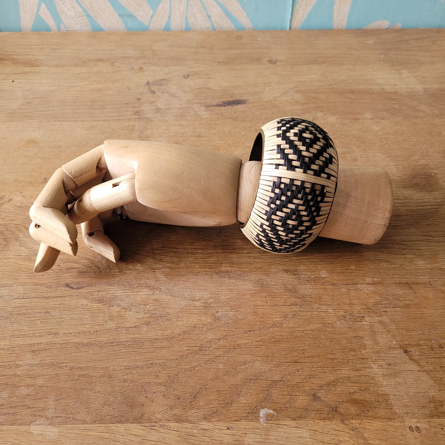 1970s woven cane & brass bangle with black & natural basketweave pattern