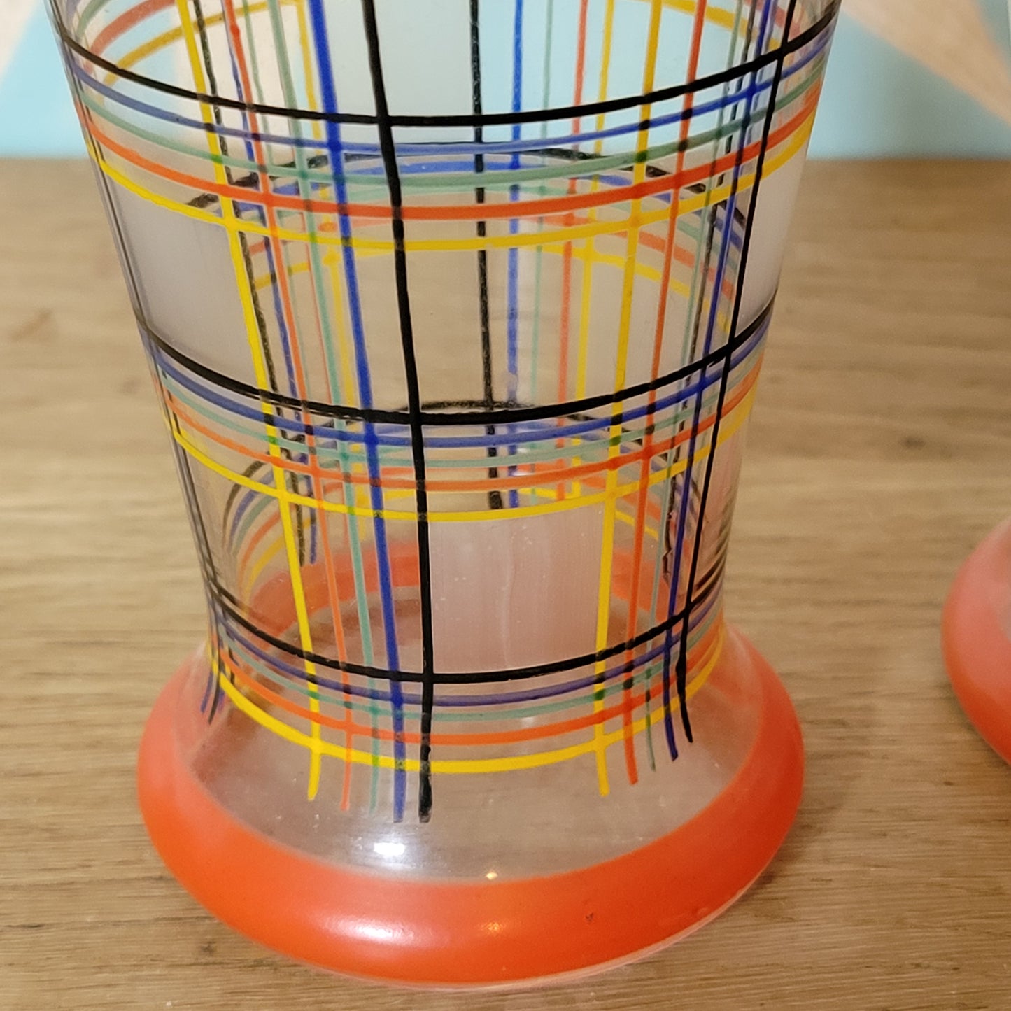 Pair of 1960s atomic plaid / spaghetti stripe drinking glasses