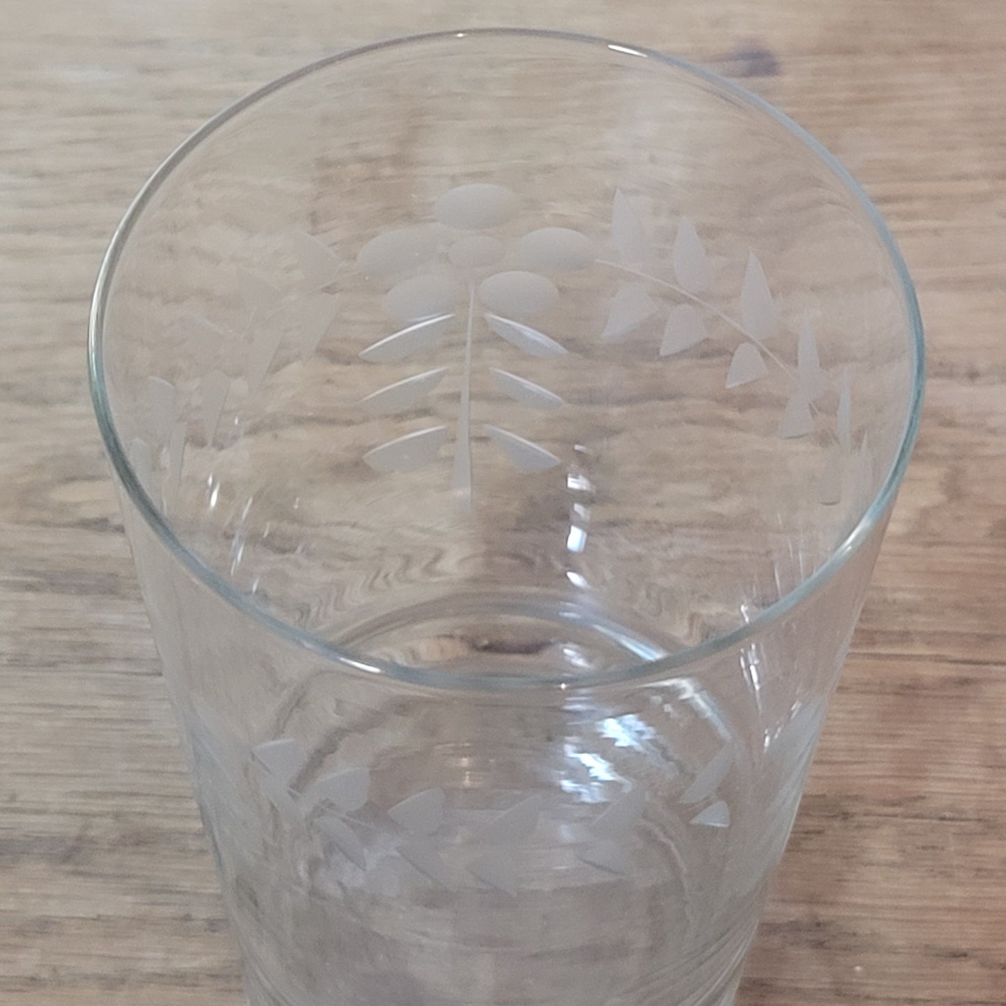 Pair of 1950s/60s cut glass water tumblers with leaf & berry design
