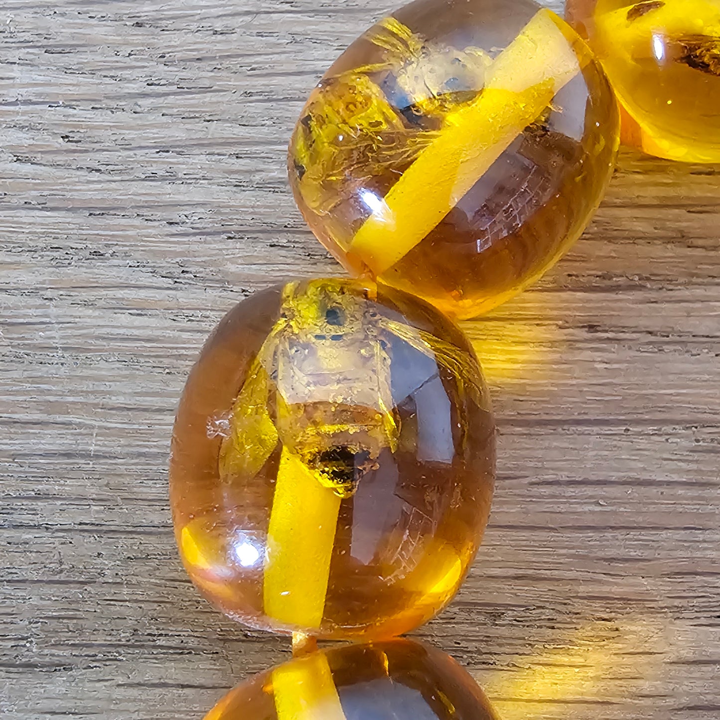 Vintage amber effect resin bead bracelet with insect inclusions