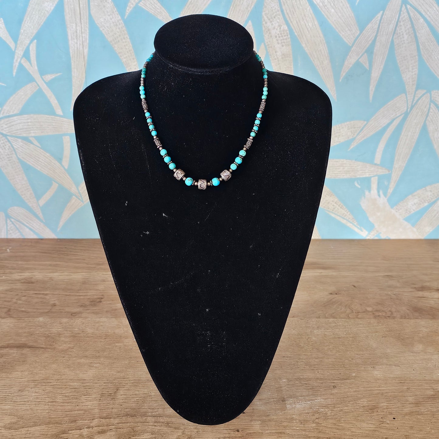 1990s turquoise stone bead necklace with tribal style silver tone spacers