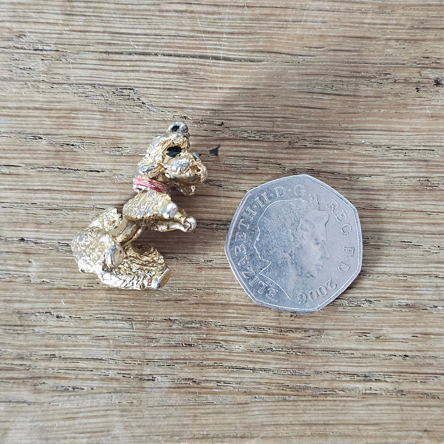 Vintage gold-tone begging French poodle pendant with red collar