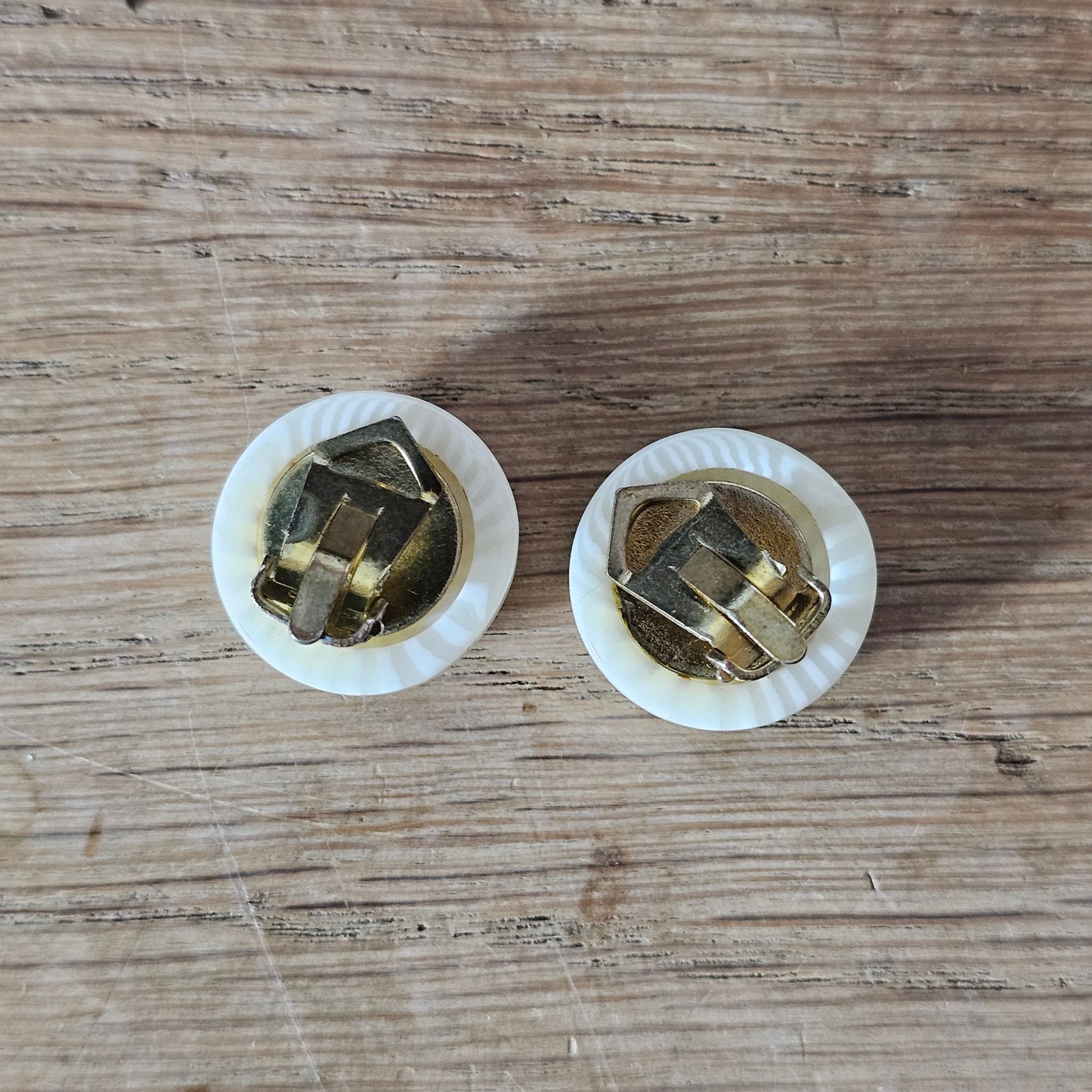1960s ivory sunburst textured plastic button clip-on earrings