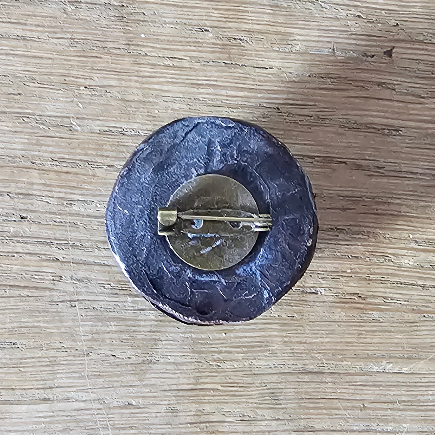 Handmade brooch using vintage dark brown ruched raffia domed button