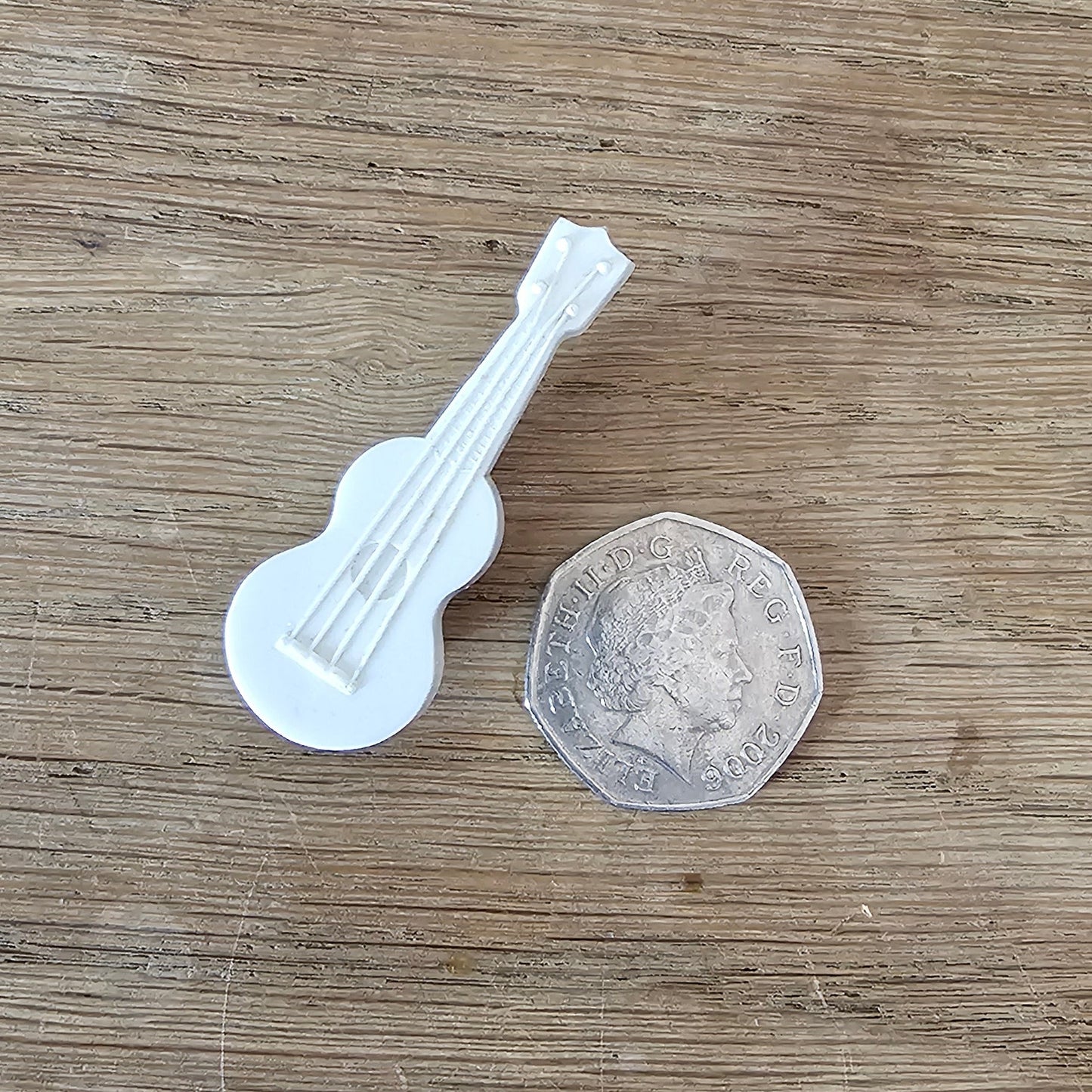 1930s/40s white moulded plastic guitar brooch