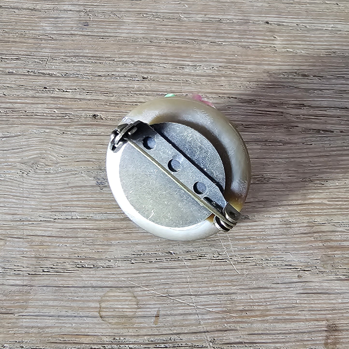 Home-made brooch using vintage china flowers and vintage button