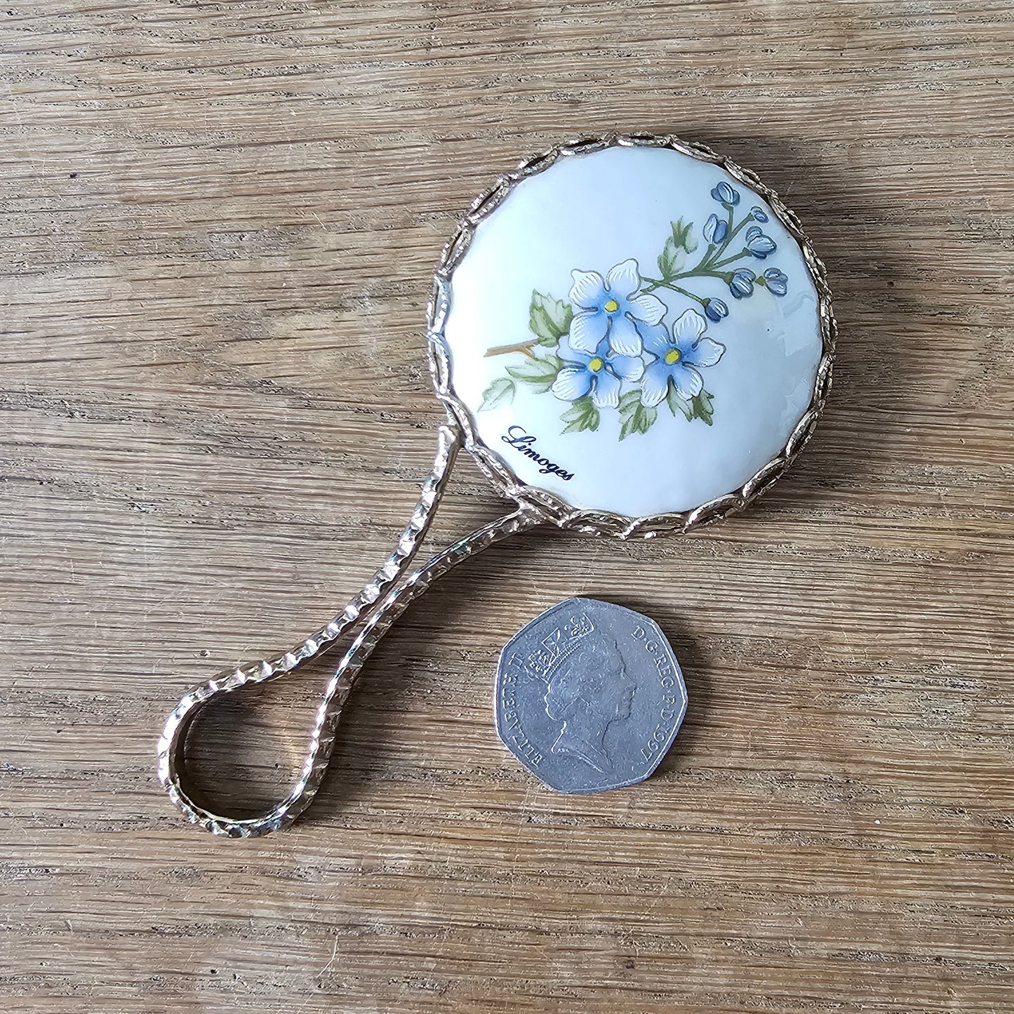 1960s Limoges gold-tone floral porcelain hand mirror