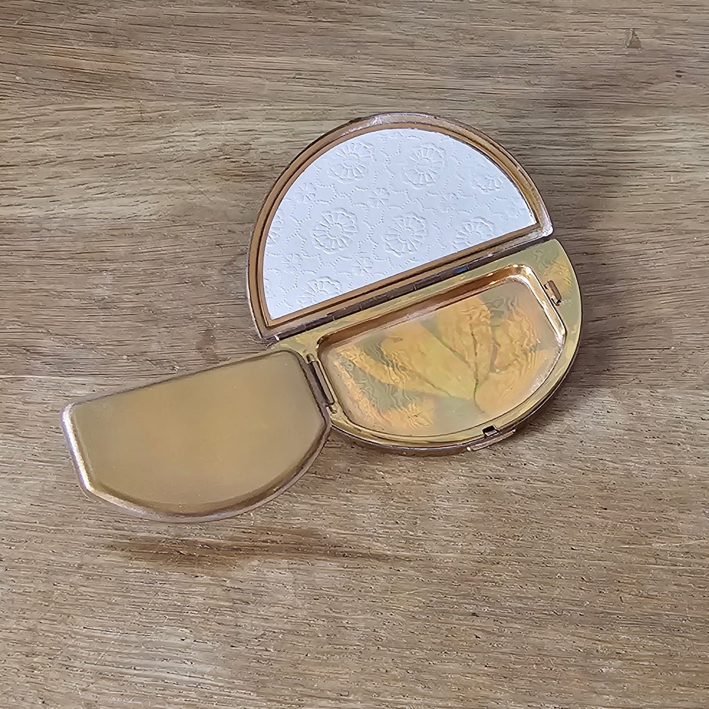 1950s needlepoint floral panel & gold-tone half moon powder compact (empty)
