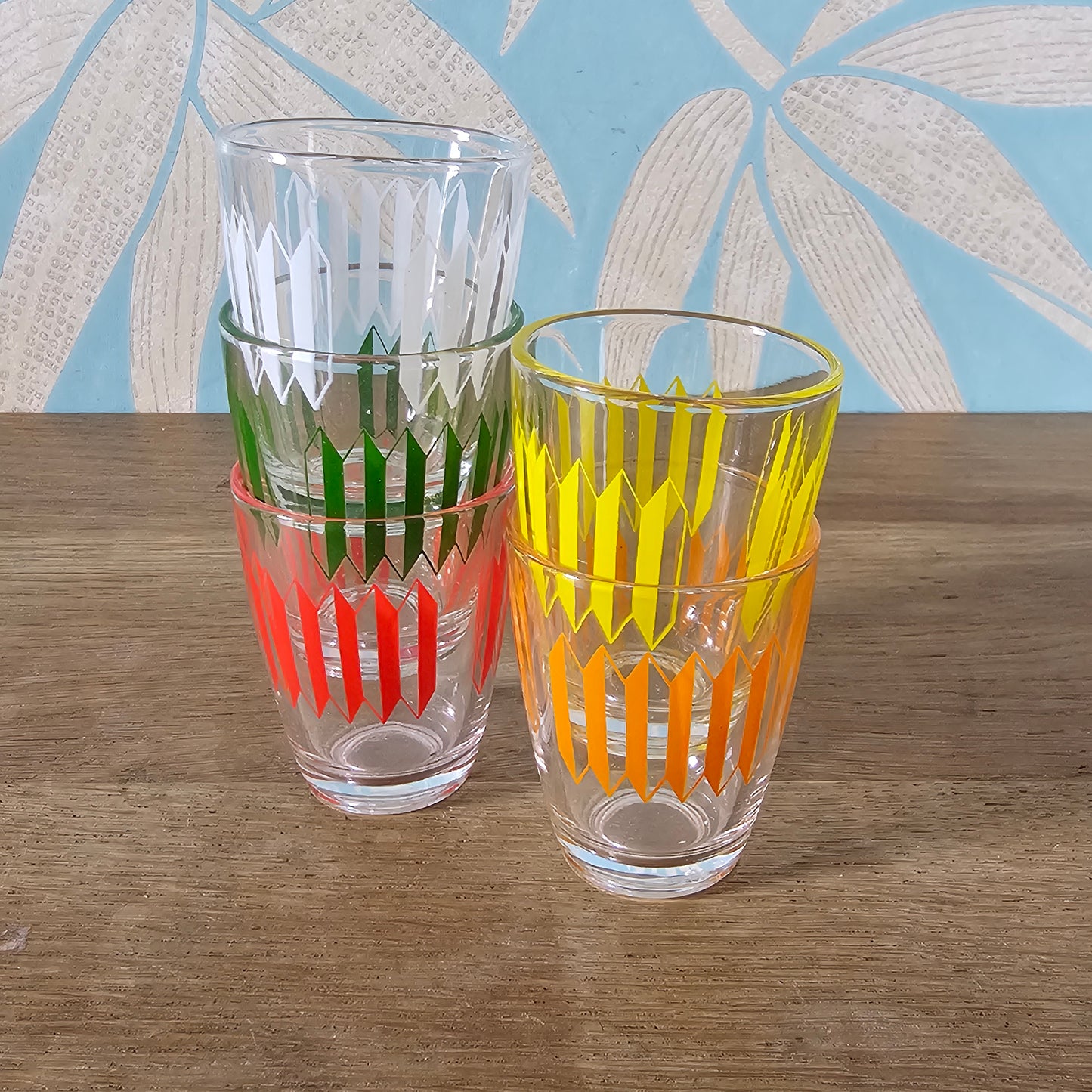 Set of five 1960s multicoloured geometric pattern shot glasses