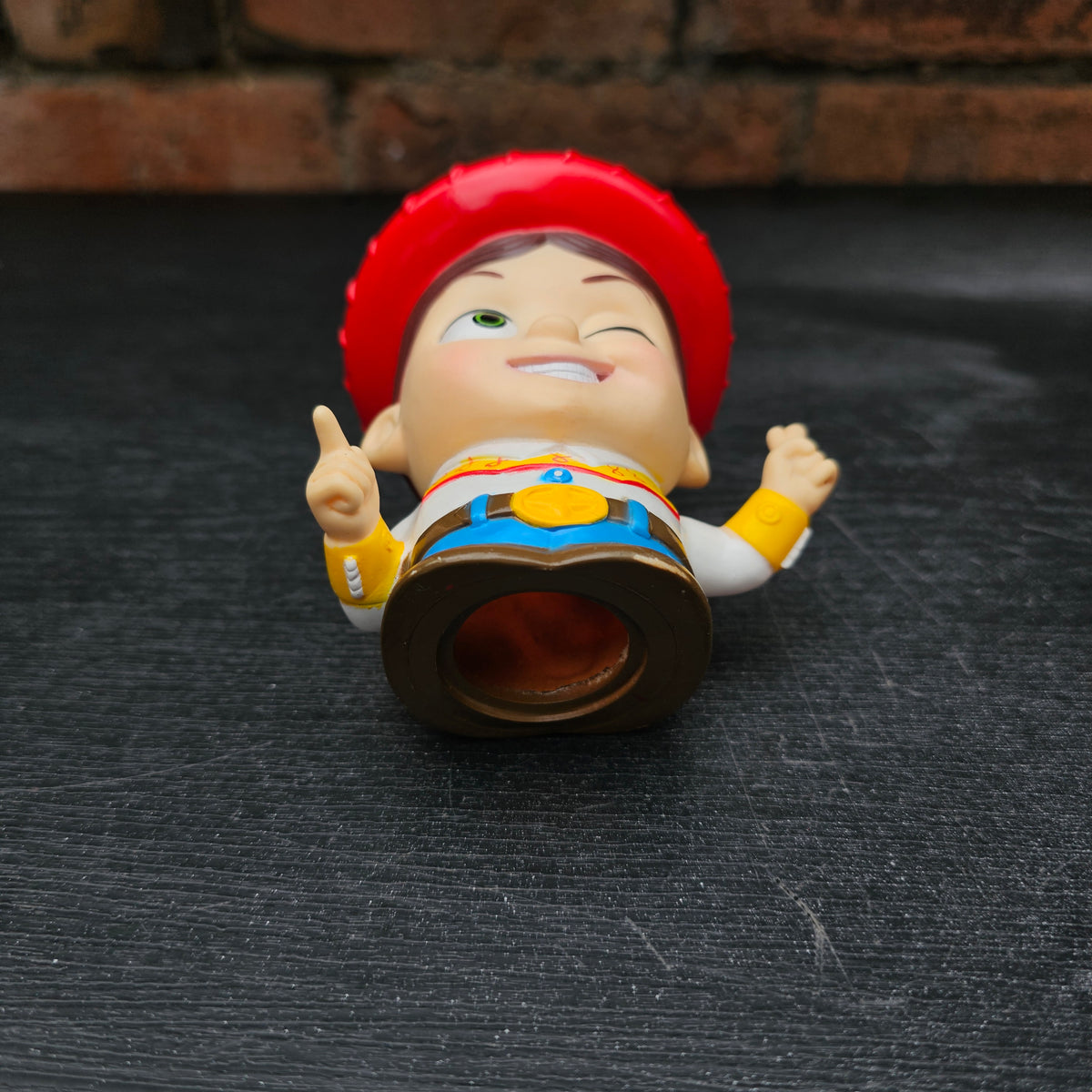 Pair of early 2000s Disney Pixar Toy Story Woody & Jessie mini money boxes