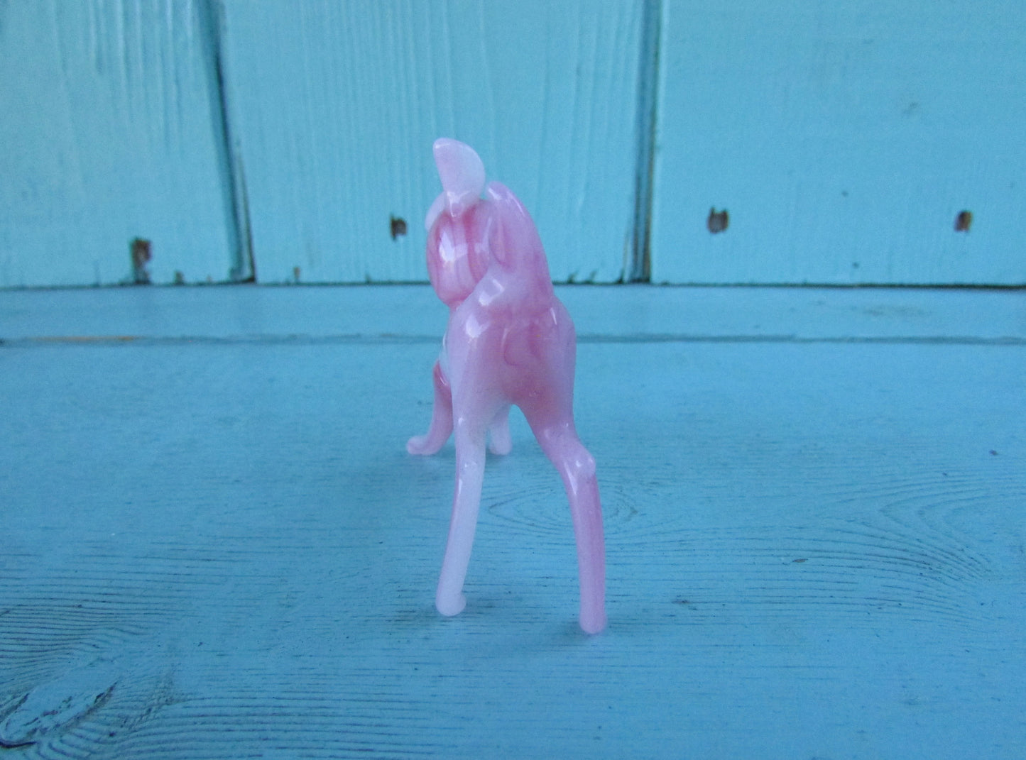 1960s streaked pink blown art glass fawn
