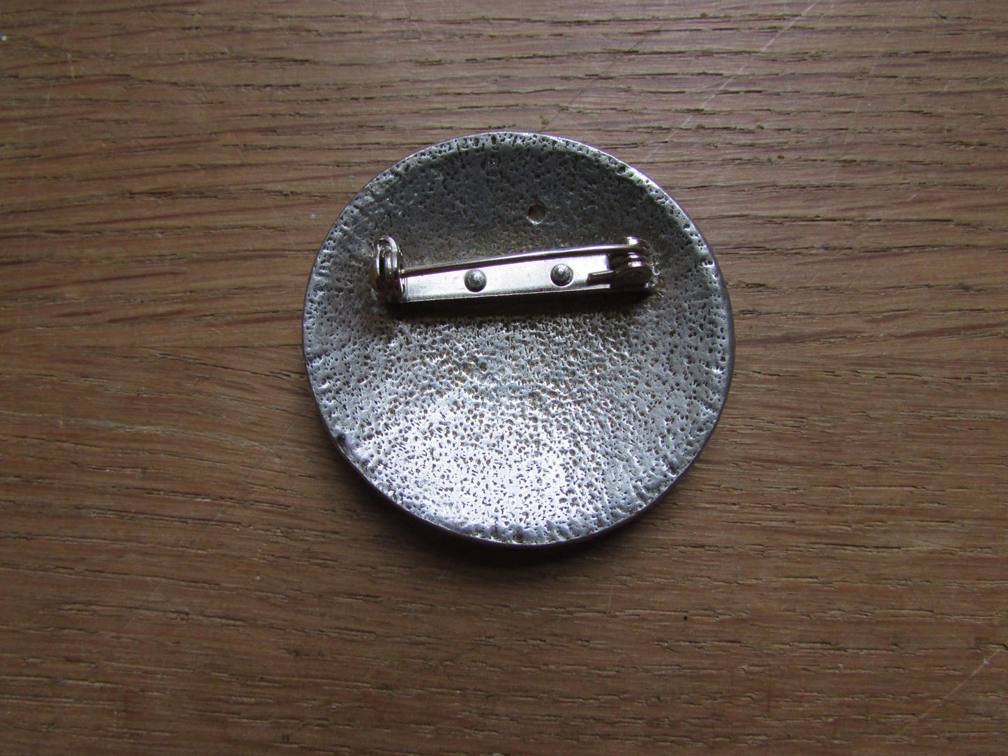 Vintage Celtic pewter knotwork brooch with green agate cabochon detail