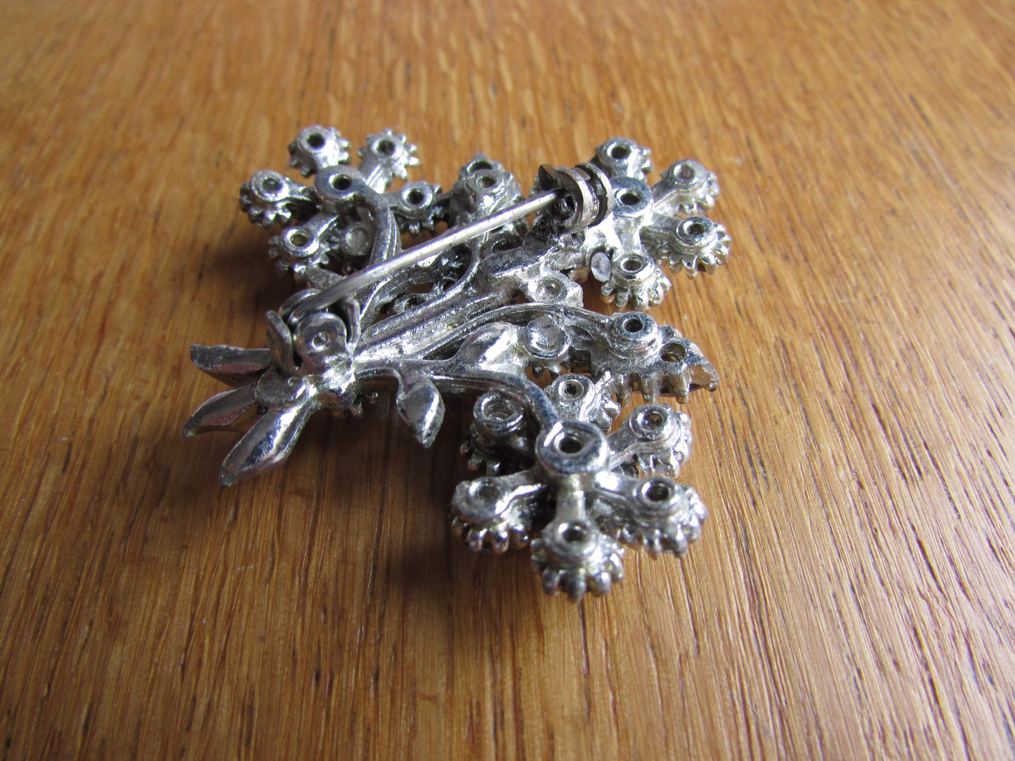 Vintage silver-tone & diamanté floral sprig brooch