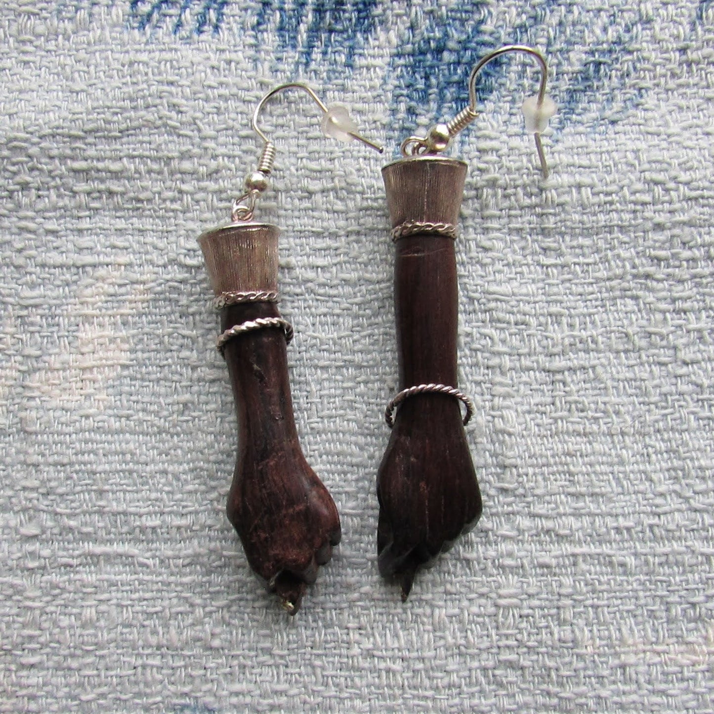 Home-made earrings made using vintage Gothic resin 'hands' & silver plated findings