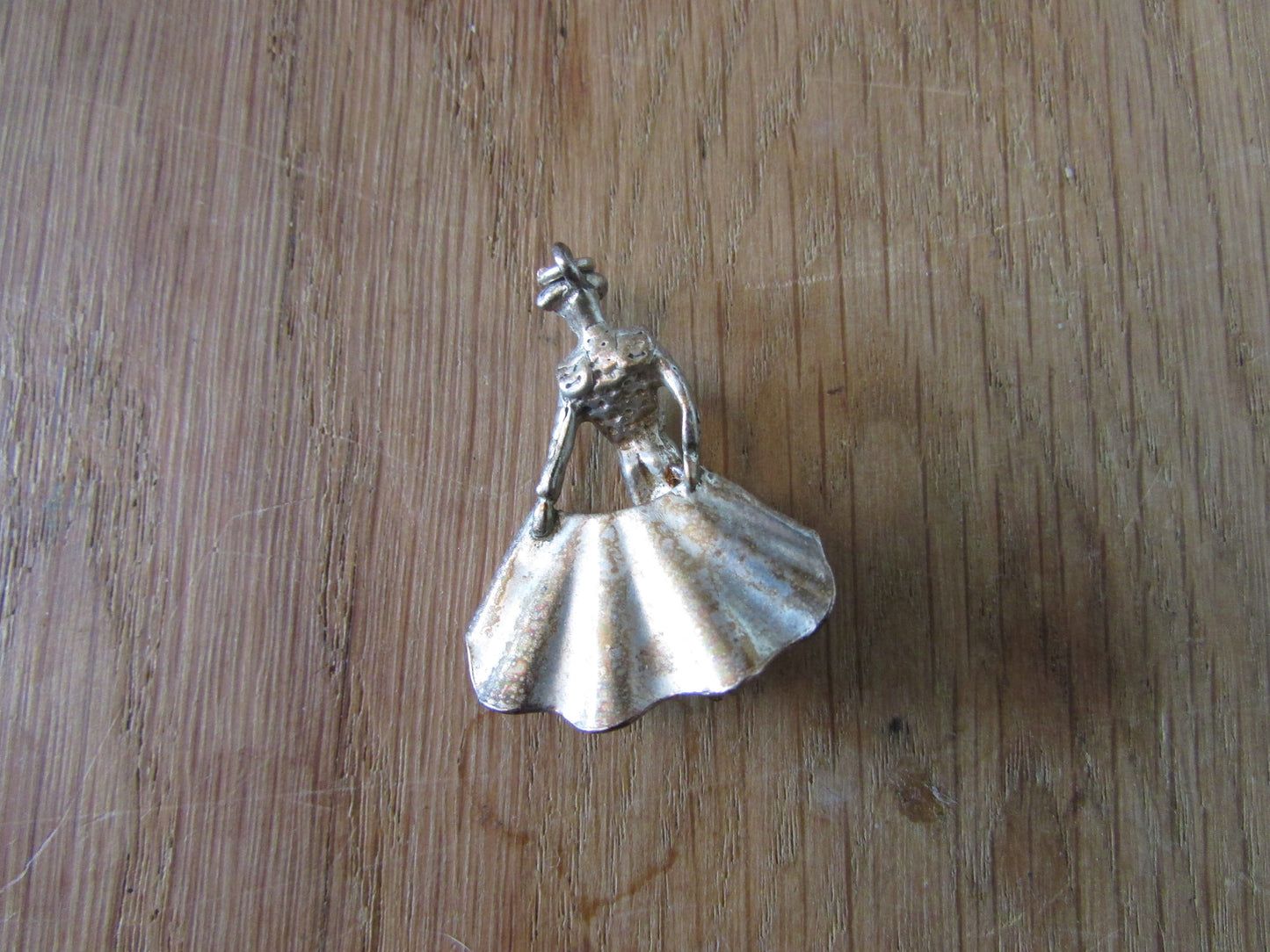 Vintage silver-tone matador charm