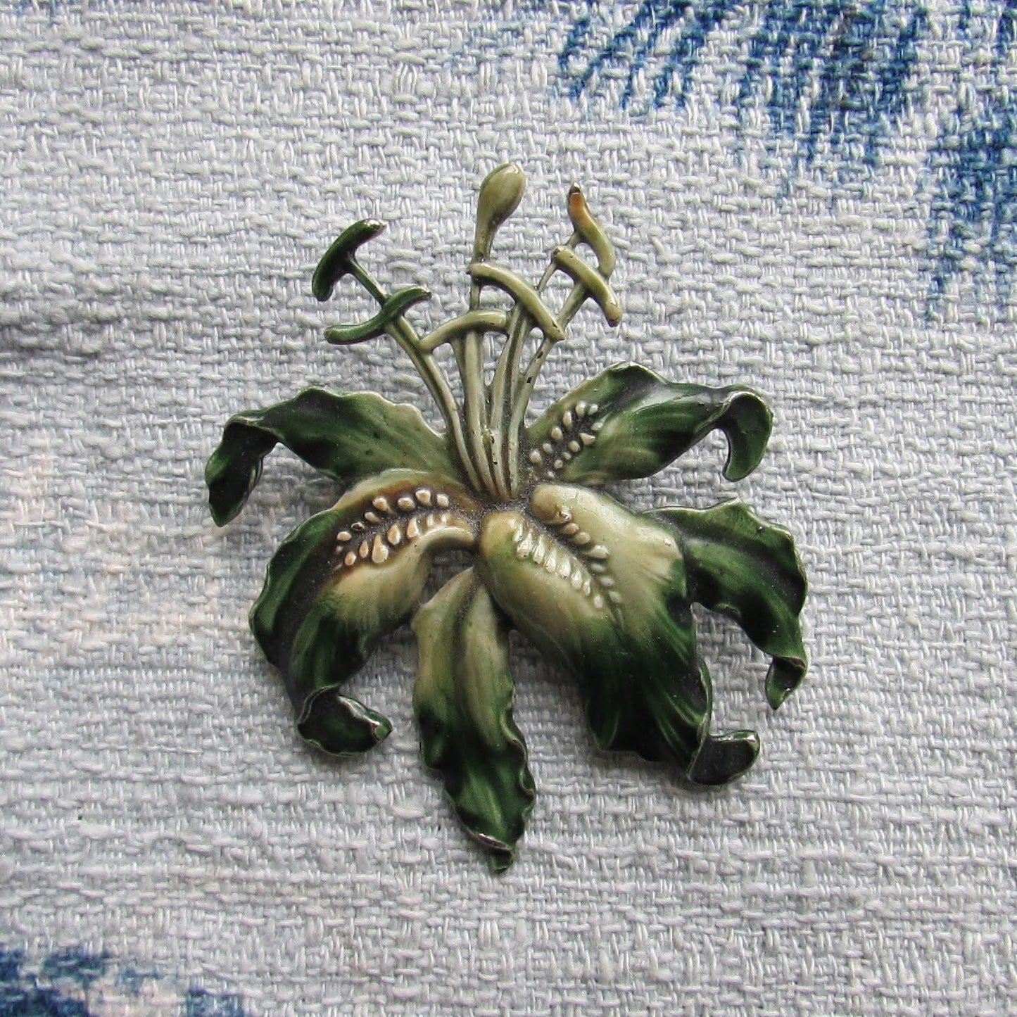 Large 1960s Art Nouveau-inspired enamelled metal lily brooch