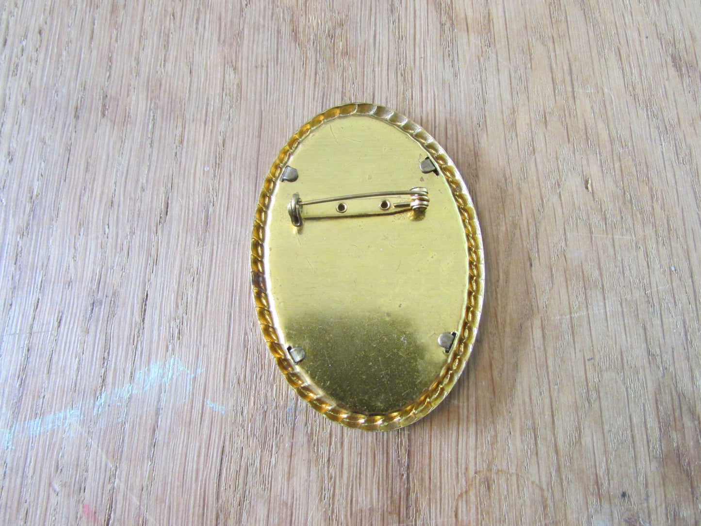 Vintage gold-tone barley twist oval frame embroidered roses brooch