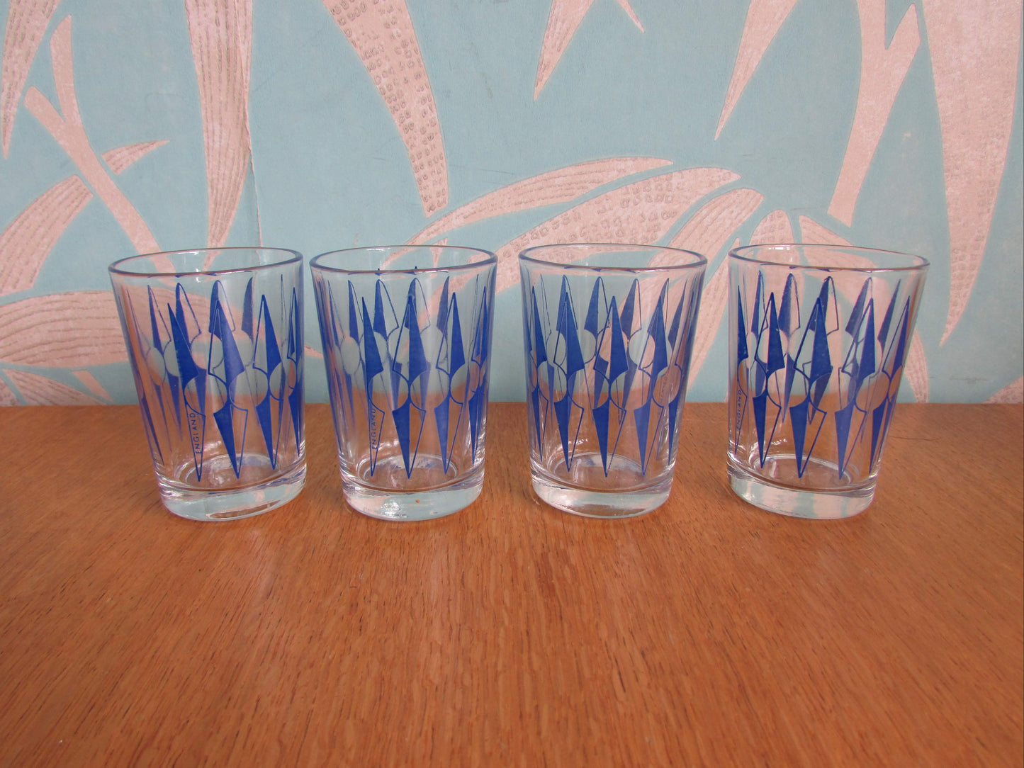 Set of four 1960s blue "Zulu" tot glasses by Hardie Williamson for Ravenhead Glass