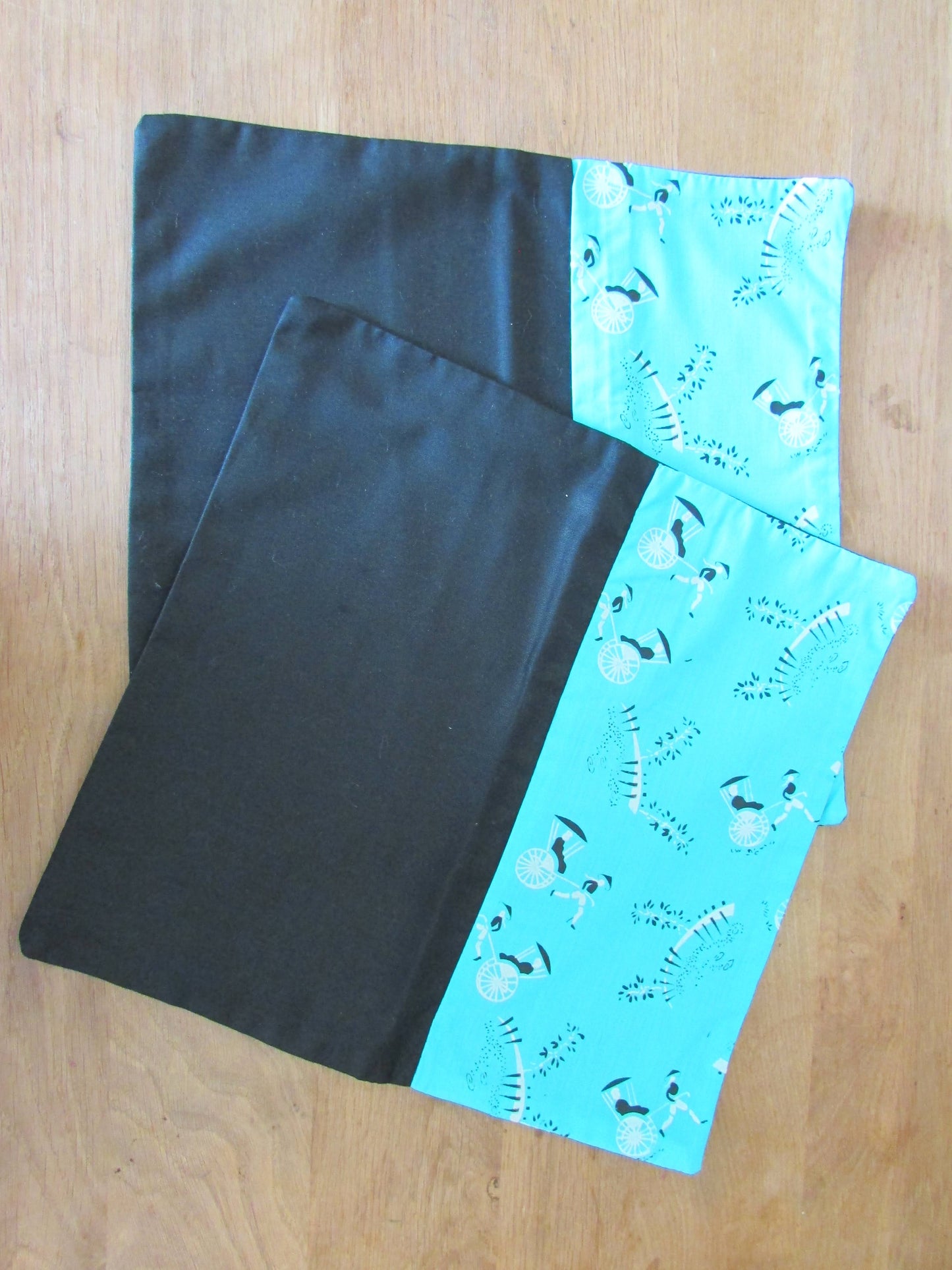 Home-made 1950s two-tone rickshaw pattern cushion cover with contrast black reverse