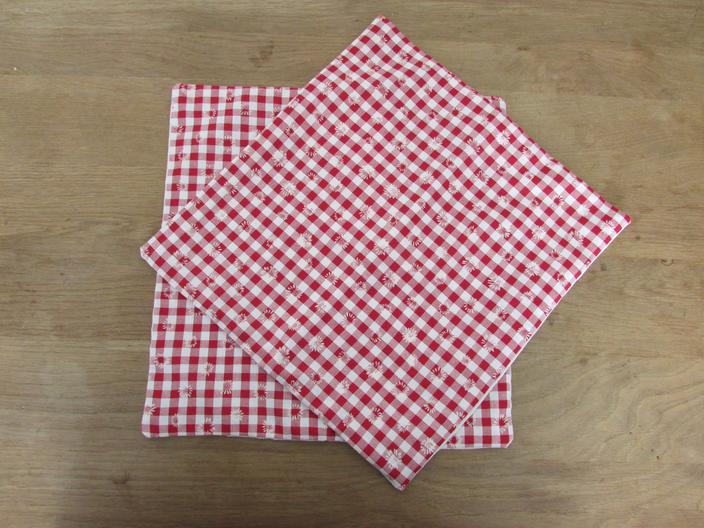Home-made vintage red & white Gingham cushion cover with allover daisy motif and contrast white reverse