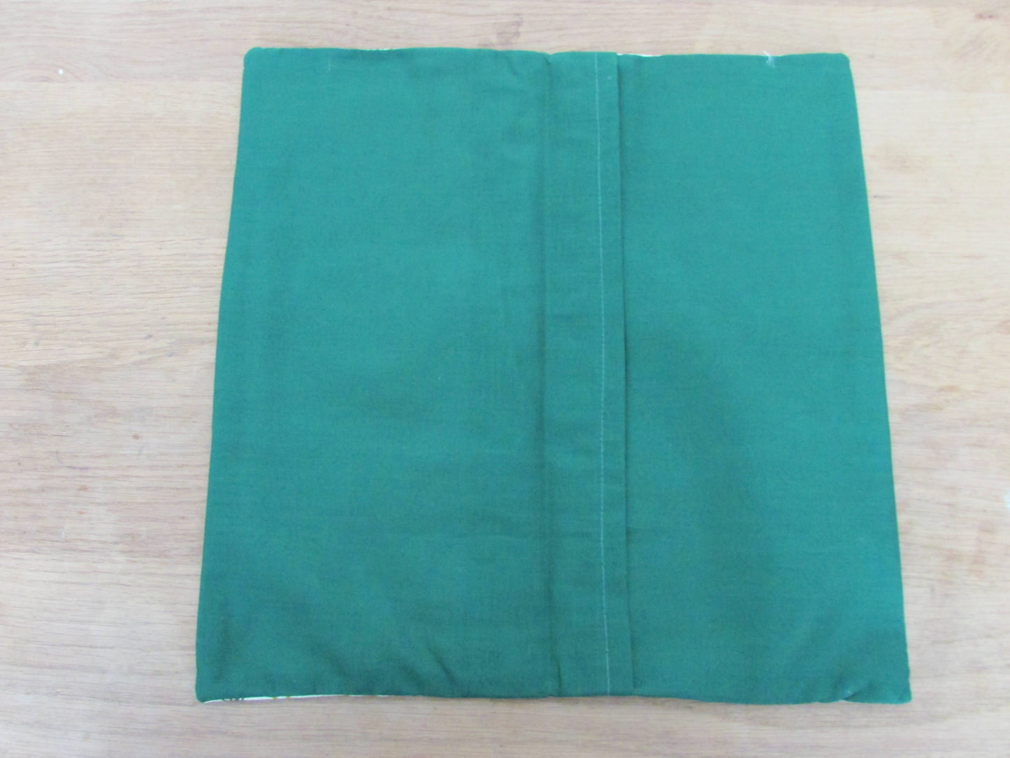 Home-made 1950s-inspired Atomic Starburst pattern cushion cover with contrast green OR rust reverse