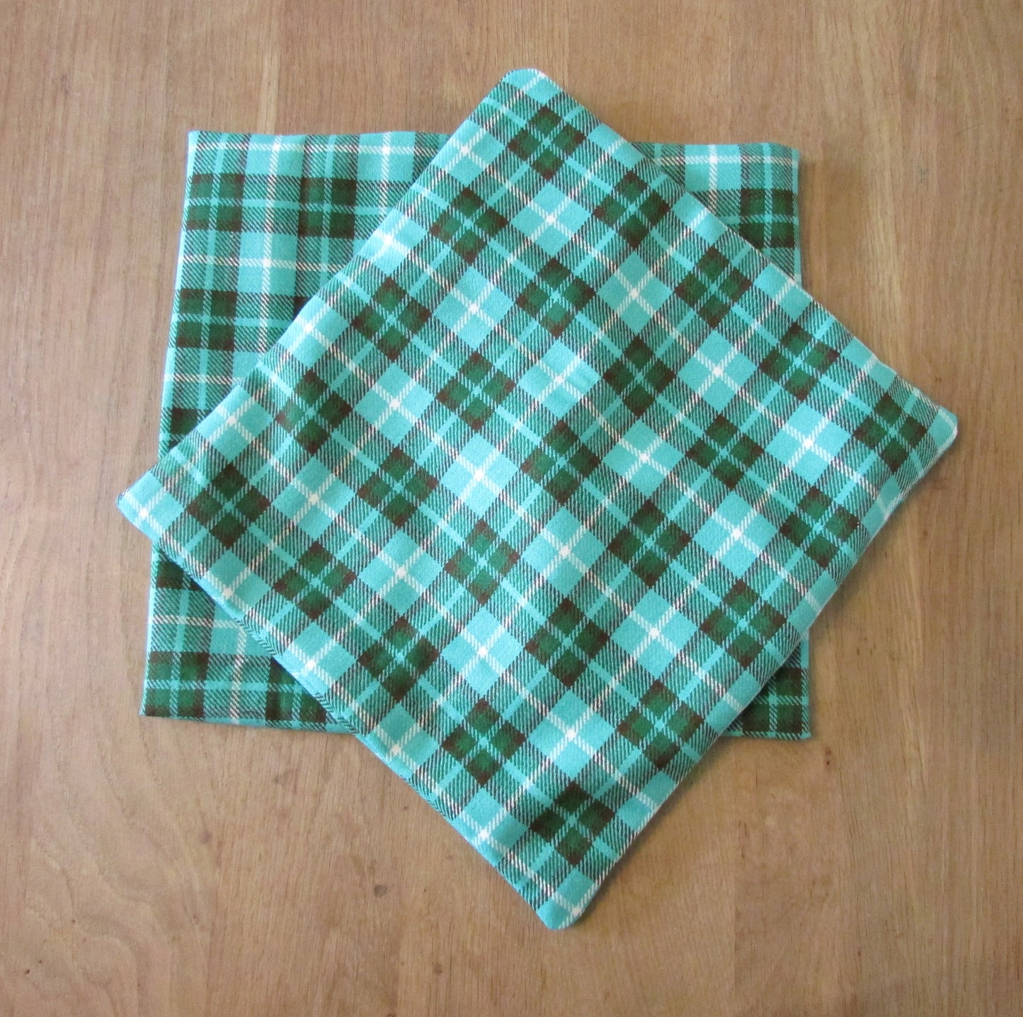 Home-made vintage green plaid cushion cover with same pattern reverse