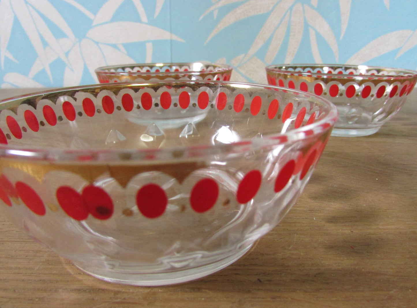 Set of three 1950s red spot glass dessert dishes