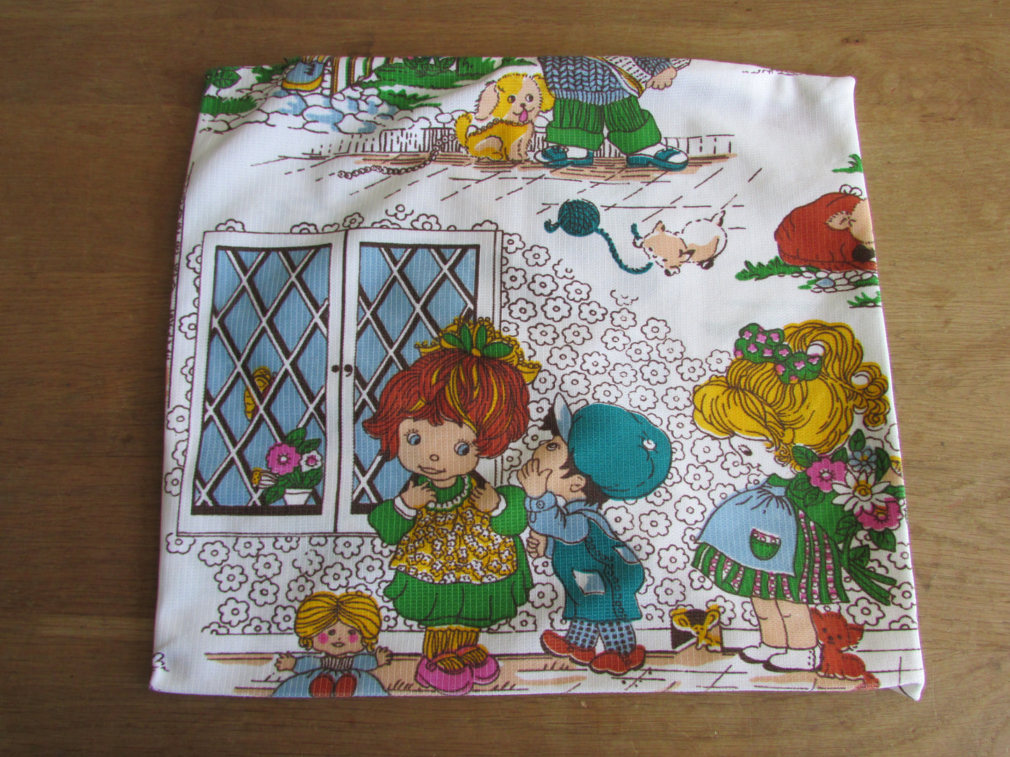 Two vintage hand-made Holly Hobbie-style cushion covers