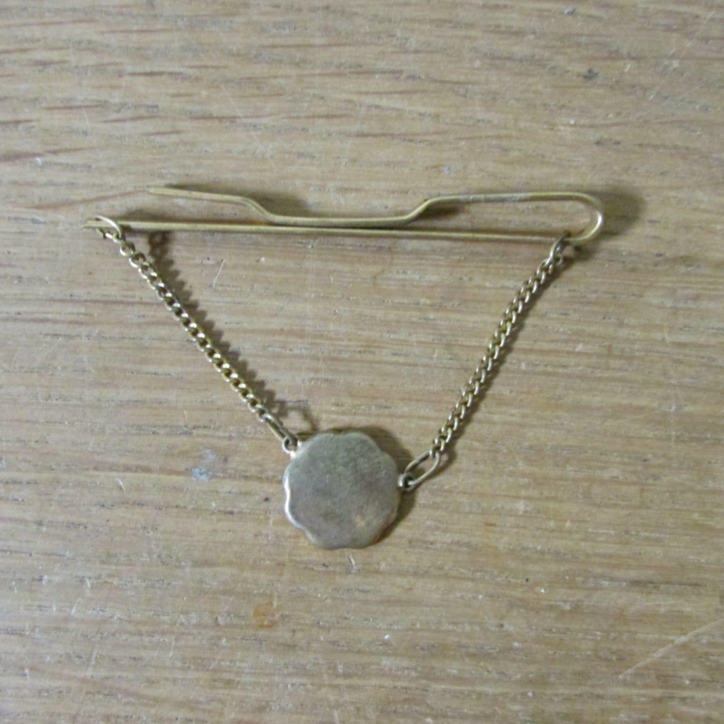 1960s gold-tone Damascene tie clip with hanging landscape medallion