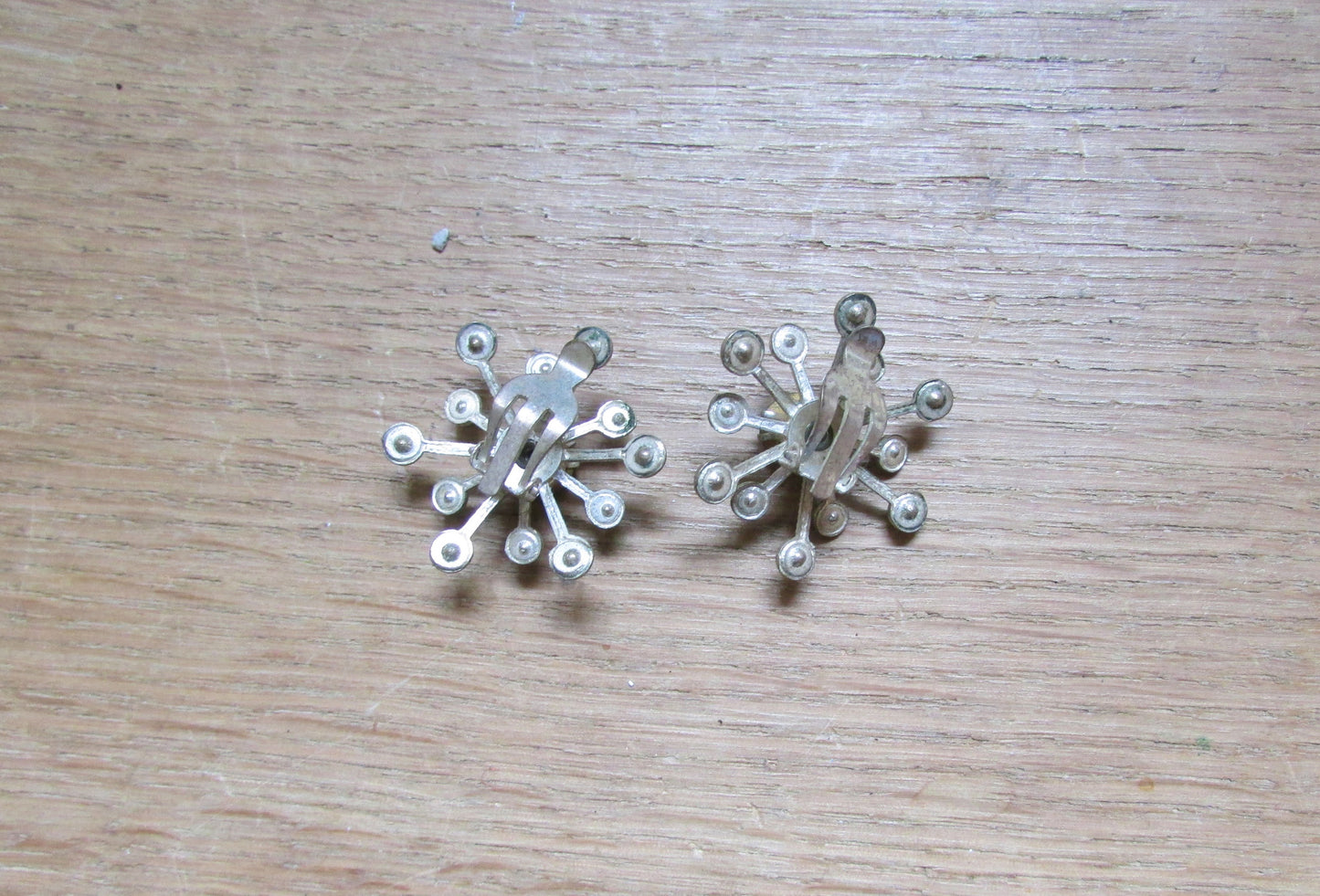 1950s silver-tone & aqua glass rhinestone starburst clip-on earrings