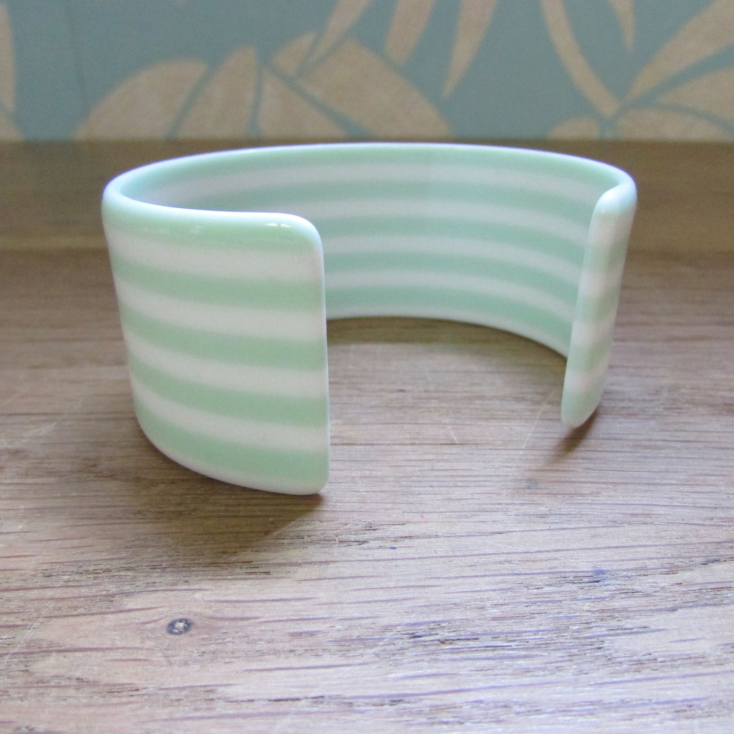 circa. 1980s mint green & white striped plastic open cuff bangle