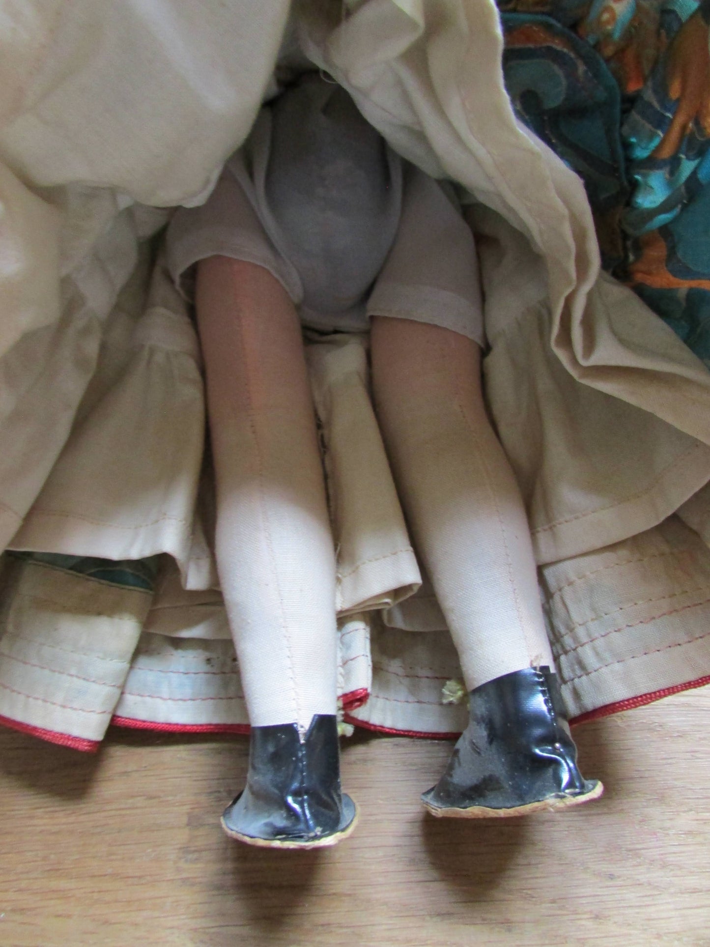 Vintage Hungarian folk art doll in traditional dress, with handpainted porcelain face, & cloth limbs