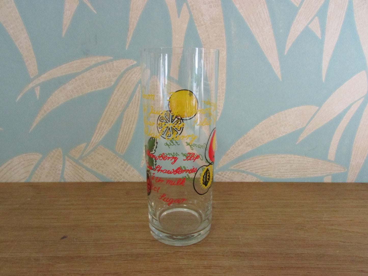 Pair of vintage retro cocktail recipe themed hi-balls