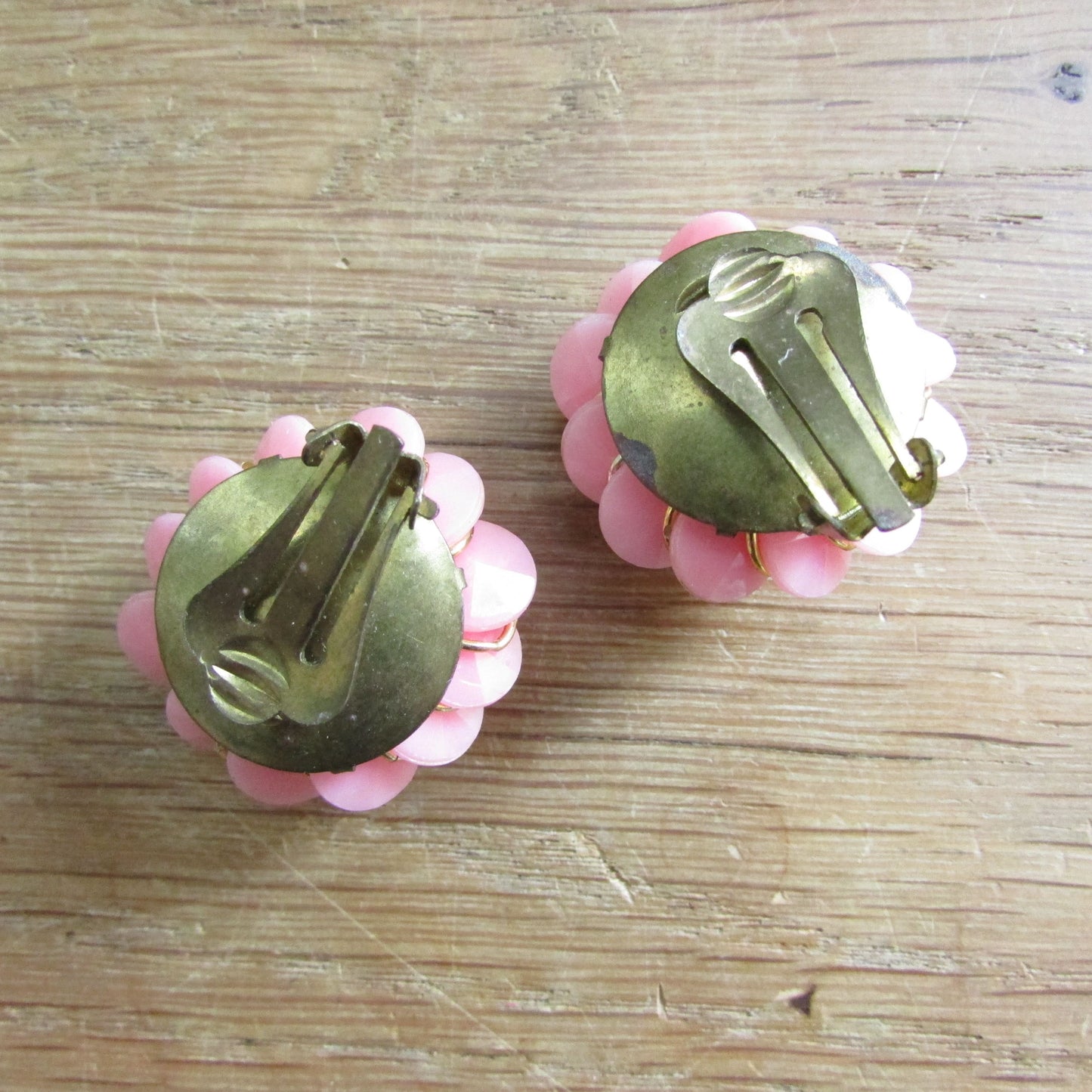 1960s pink plastic flower cluster clip-on earrings with gold-tone accents