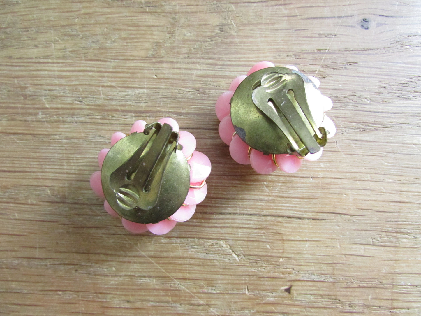 1960s pink plastic cluster flower clip-on earrings with gold-tone accents
