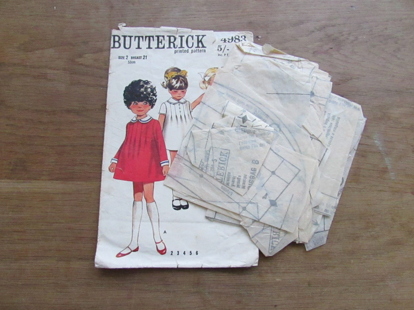 Used 1969 Butterick 4983 sewing pattern for children's one-piece dress, size 2 (complete, missing instructions)