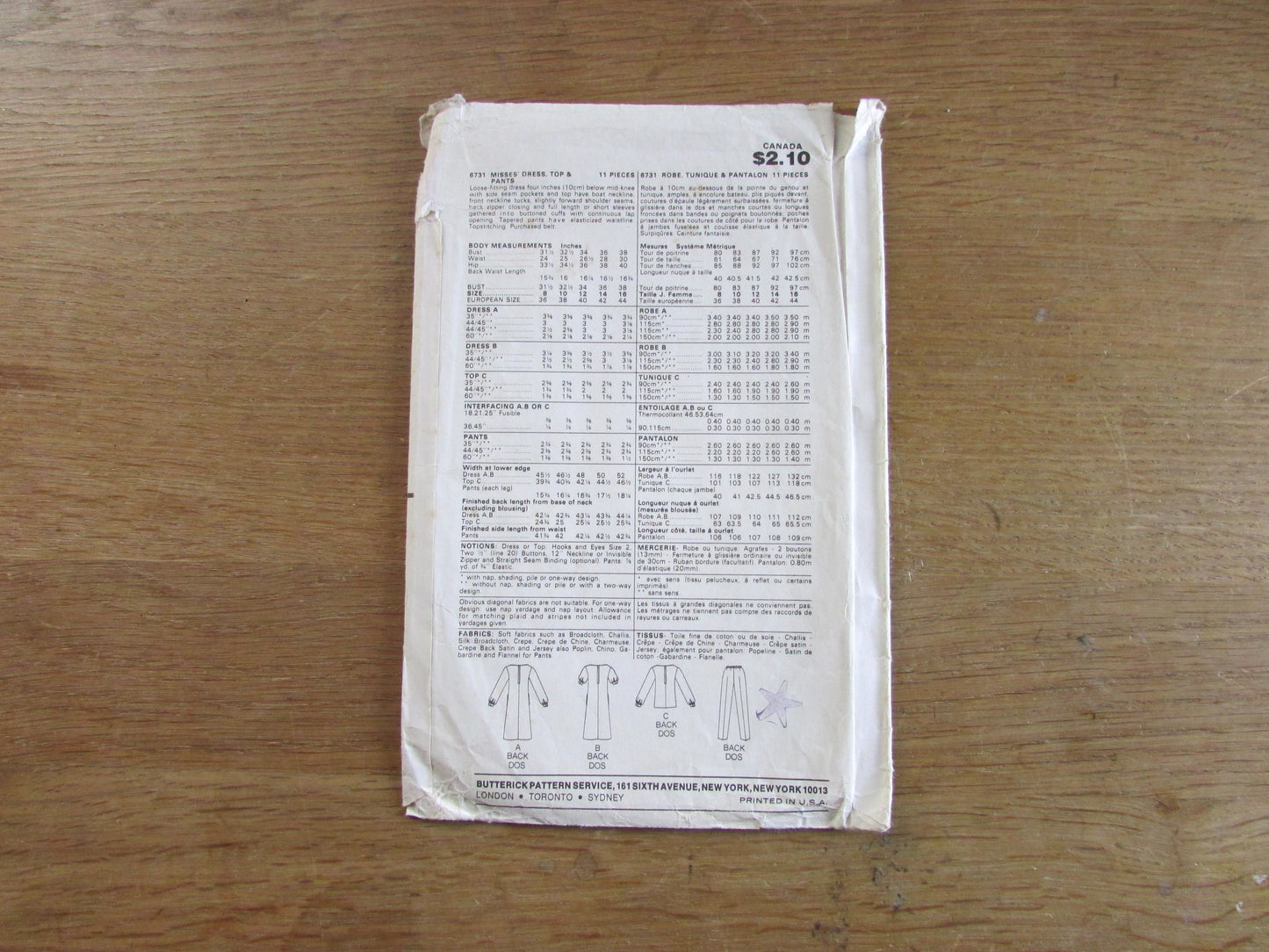 Part cut 1980s Butterick 6731 sewing pattern for misses' dress, top & pants, size 14 (complete)