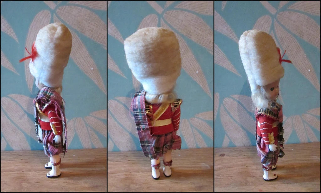 Vintage Scotsman celluloid souvenir doll with open/close eyes, "Empire Made"