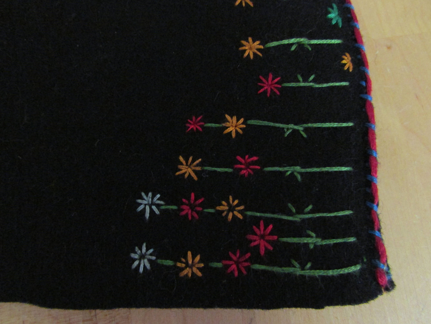 Vintage hand-made two-sided tea cosy with embroidered parrot, & floral edging detail