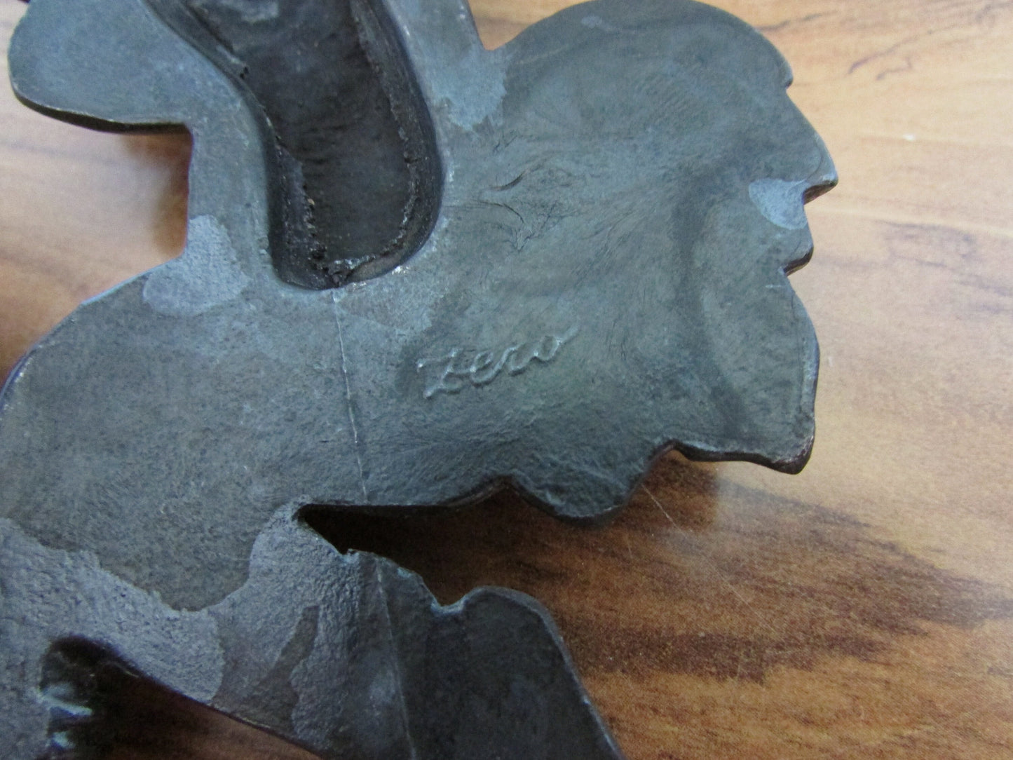 Unusual vintage Zero cast iron blackamoor infant vesta/match holder