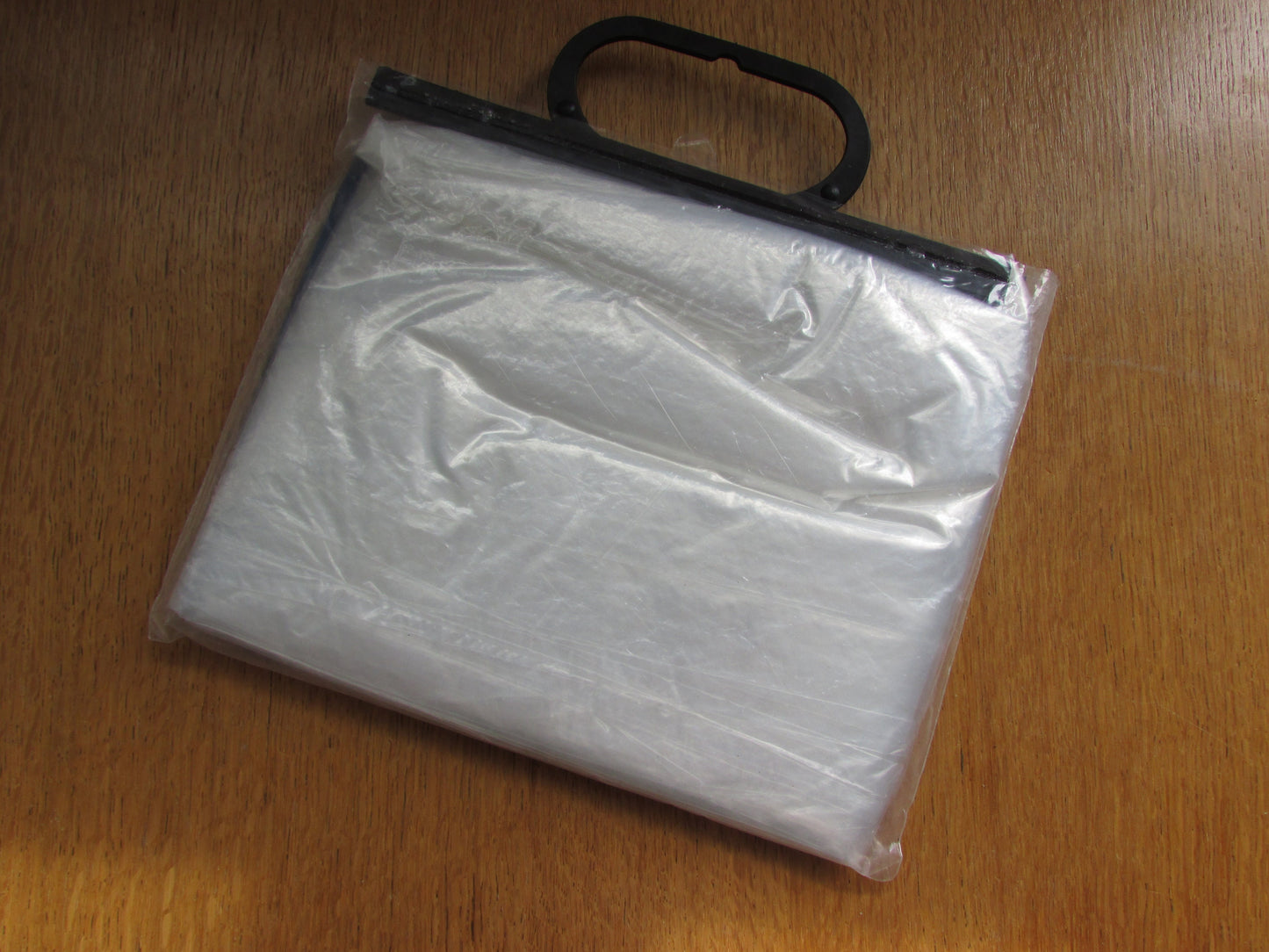 1960s Conf-Plast plastic pocket raincoat