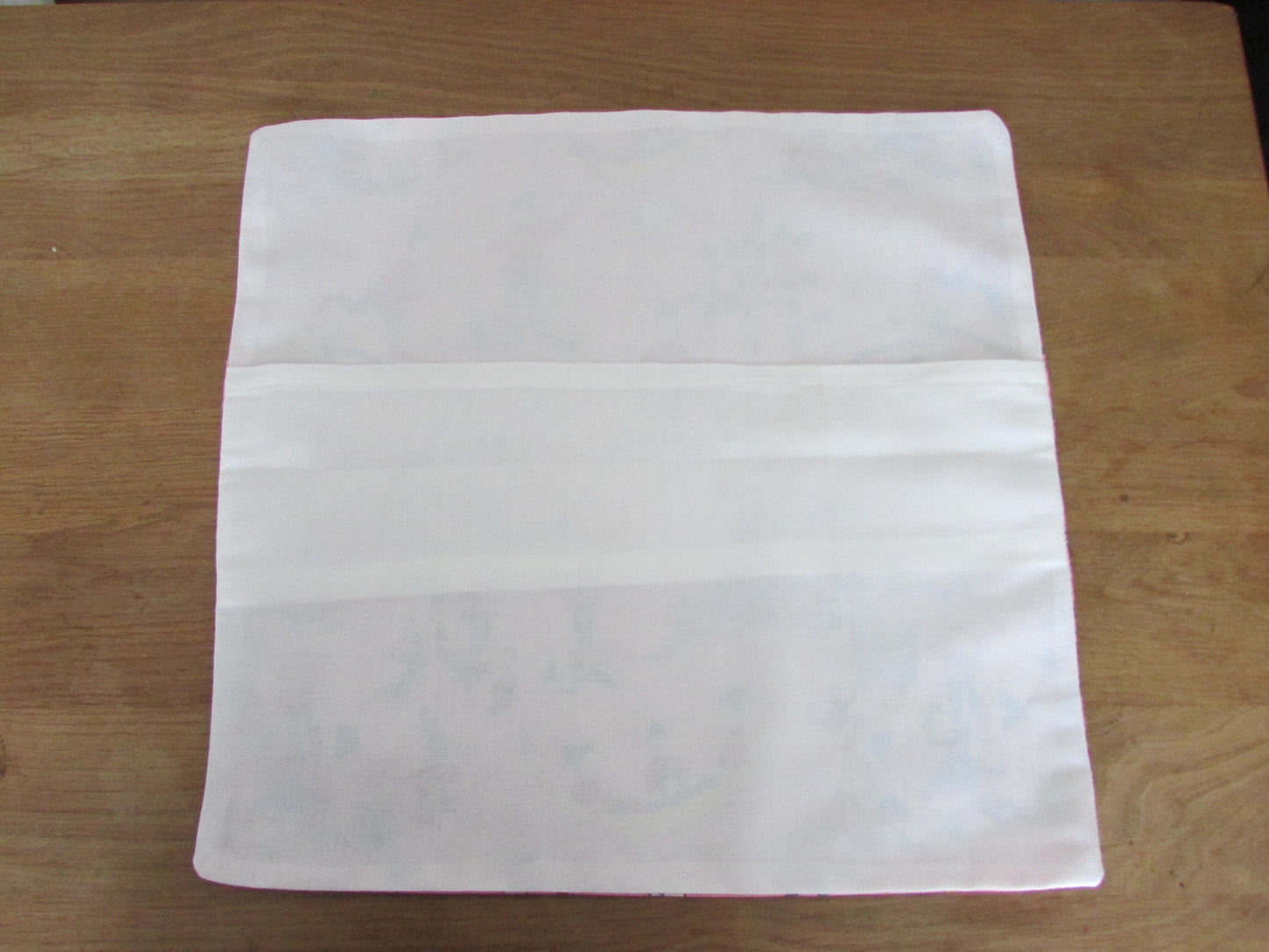 Home-made mid-century pink elf land cushion cover with contrast reverse