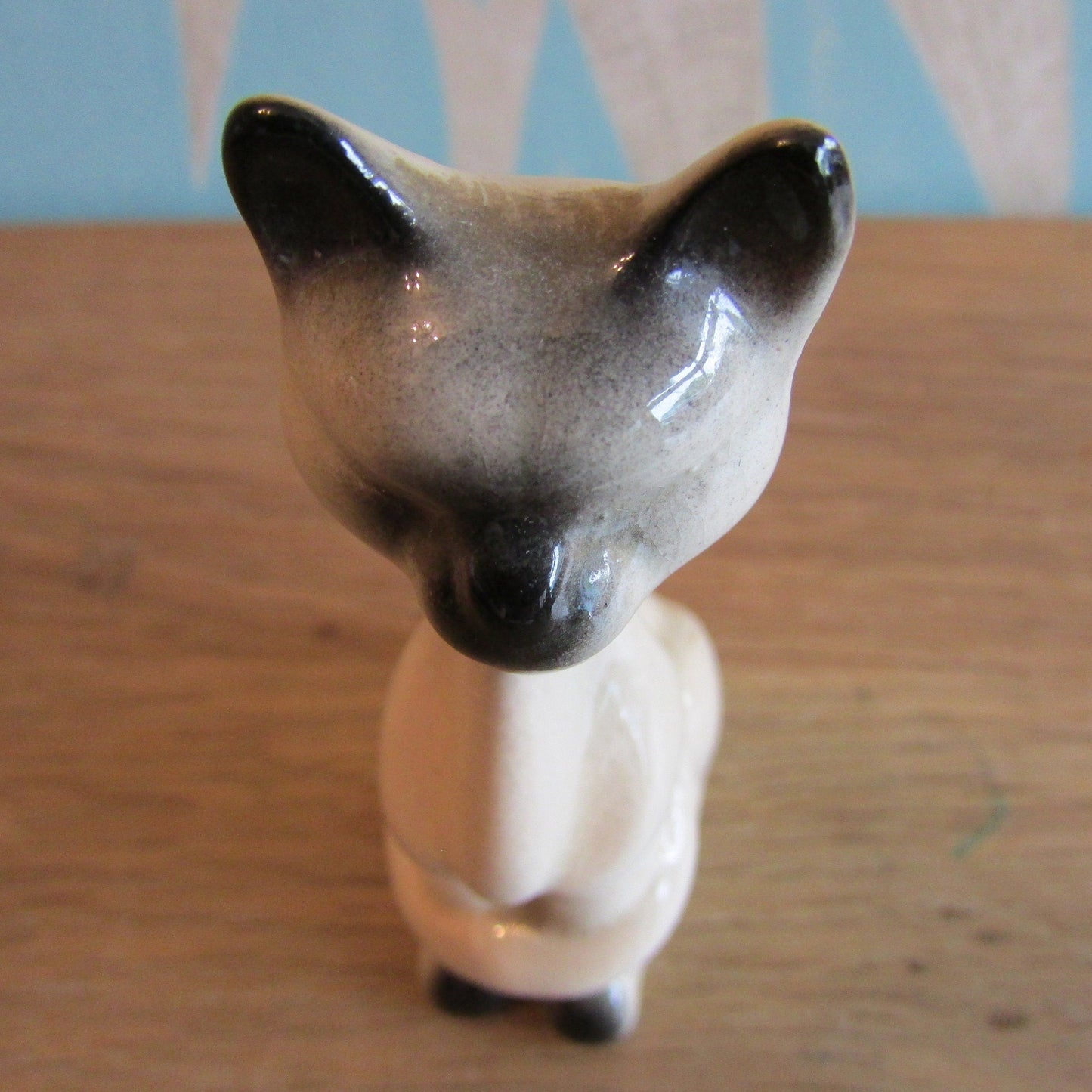 Vintage ceramic Siamese cat figurine